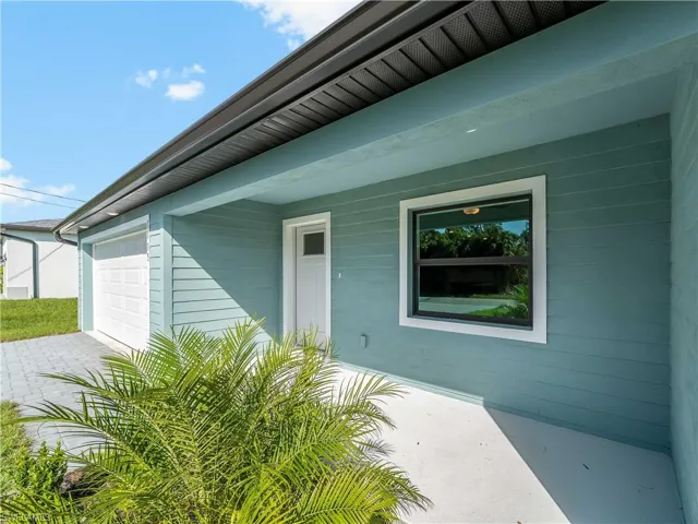 Property entrance with an attached garage