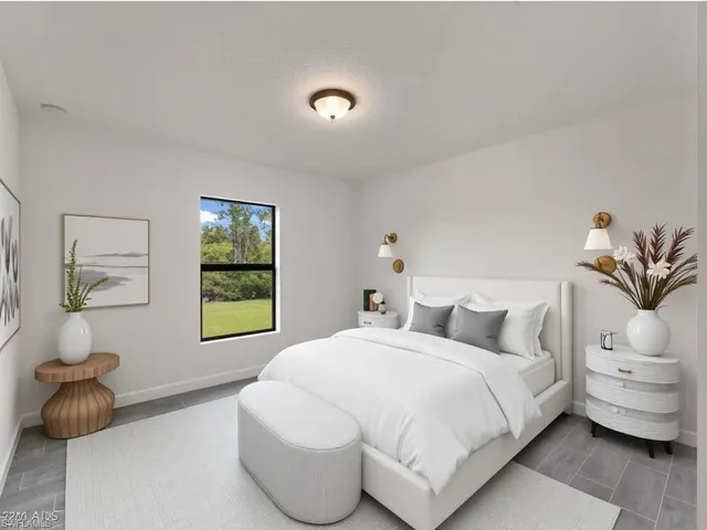 Virtually Staged  Bedroom featuring baseboards and wood finish floors