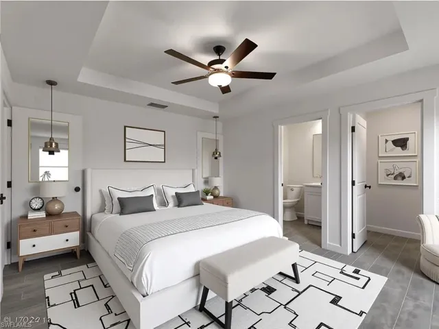 Virtually Staged Bedroom with a raised ceiling, wood tiled floors, and ceiling fan