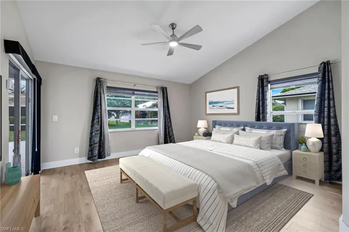 Virtually Staged Primary Bedroom with Sliding Door to Pool