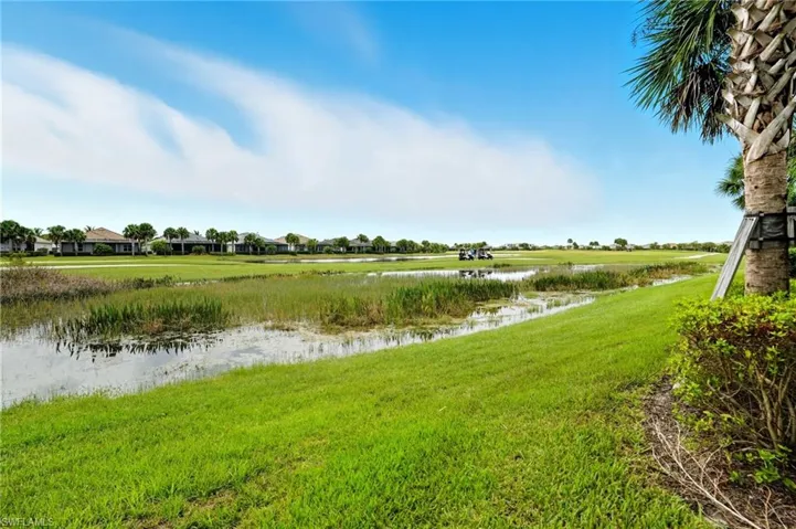 View of grassy yard featuring a water view
