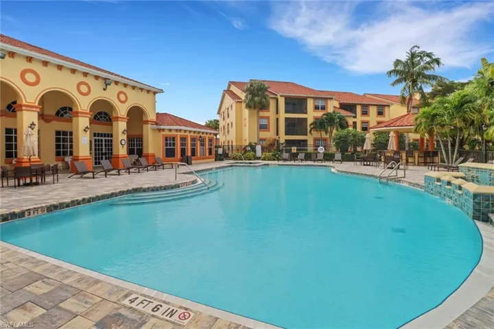 View of swimming pool featuring a patio and pool water feature