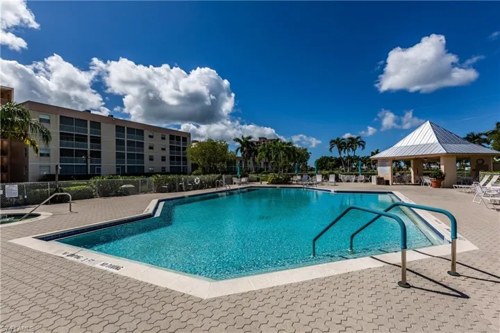 View of pool with a gazebo and a patio area