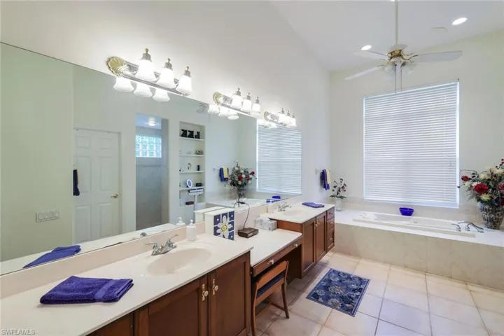 Large ensuite bathroom with soaking tub, walk in shower and vanity area.