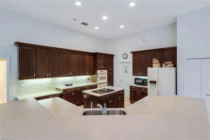 So much cabinet space PLUS additional pantry space!!