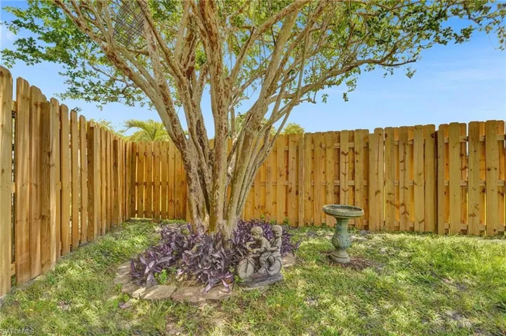 View of fenced backyard