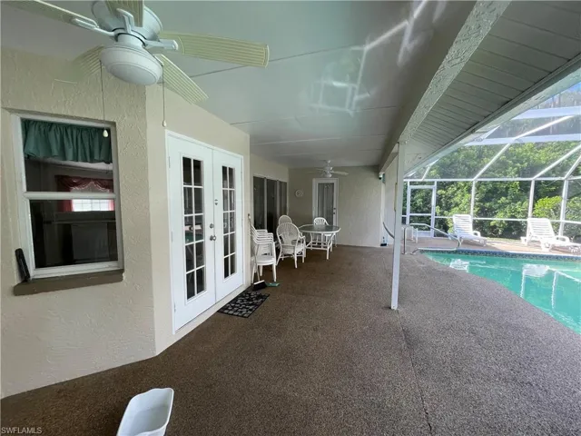 Covered deck facing pool and Preserve.