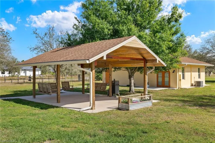 Covered BBQ Patio with Swings