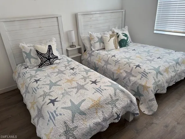 Bedroom with wood finished floors