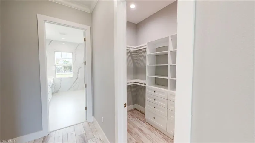 Walk in closet with closet system