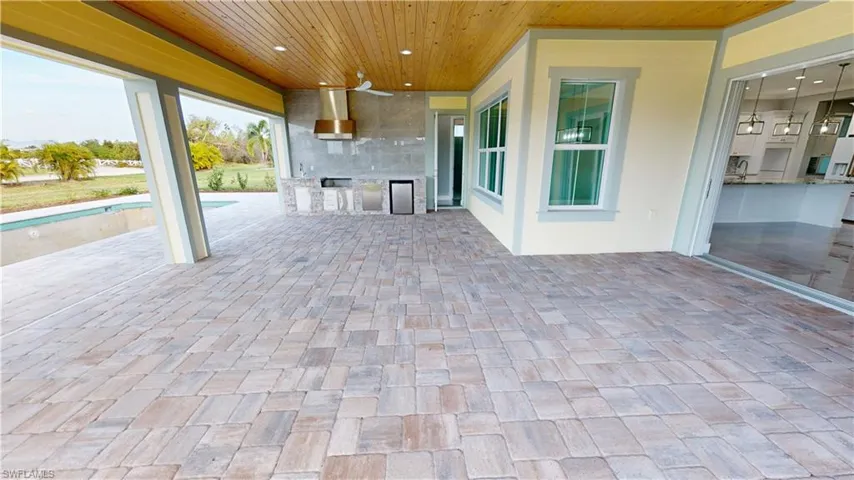 Lanai with outdoor kitchen