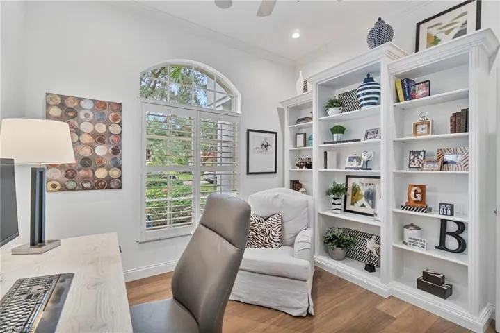 Den or office with all of built in bookshelves