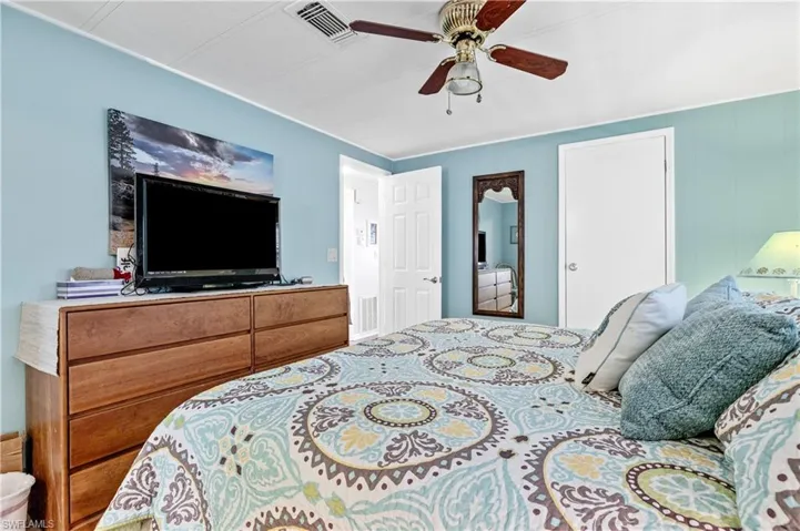 Bedroom featuring a ceiling fan