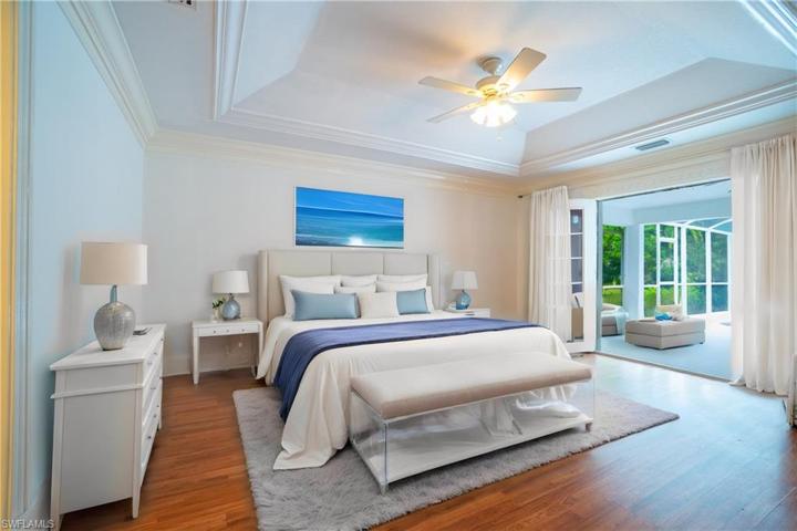 Virtually staged master bedroom.