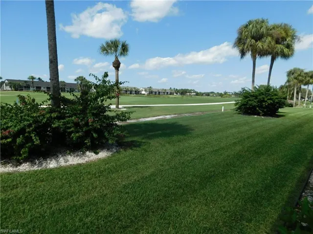 View of home's community with golf course view