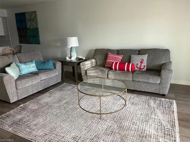 Living room featuring wood finished floors