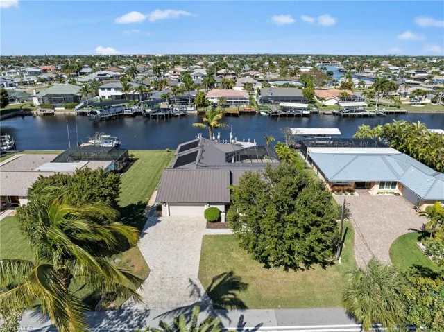 Aerial view of residential area with a large body of water