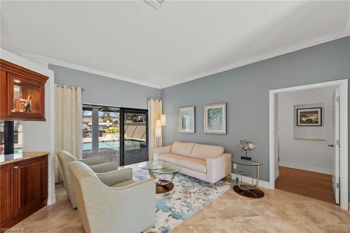 Living room with ornamental molding