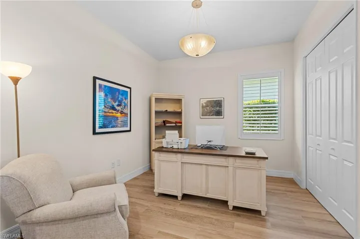 Office area featuring light hardwood / wood-style flooring