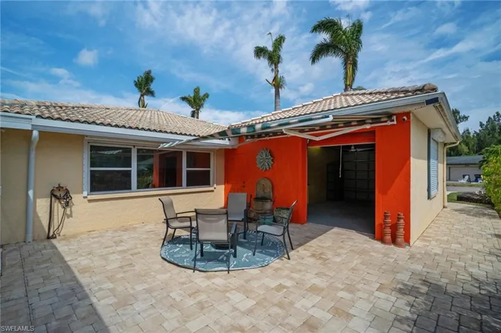 View of patio with outdoor dining area