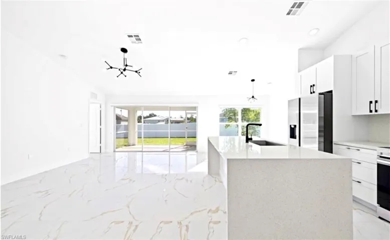 3201 NW 2nd  PL, Cape Coral, FL 33993