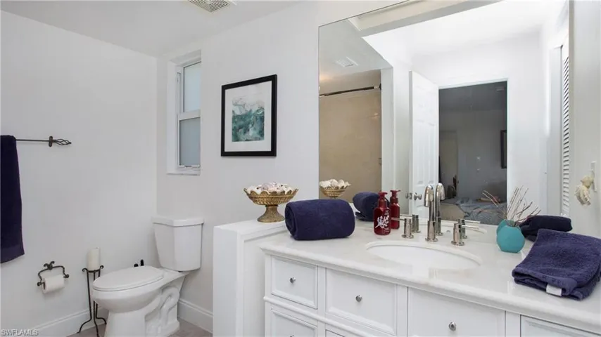 Bathroom with vanity and toilet