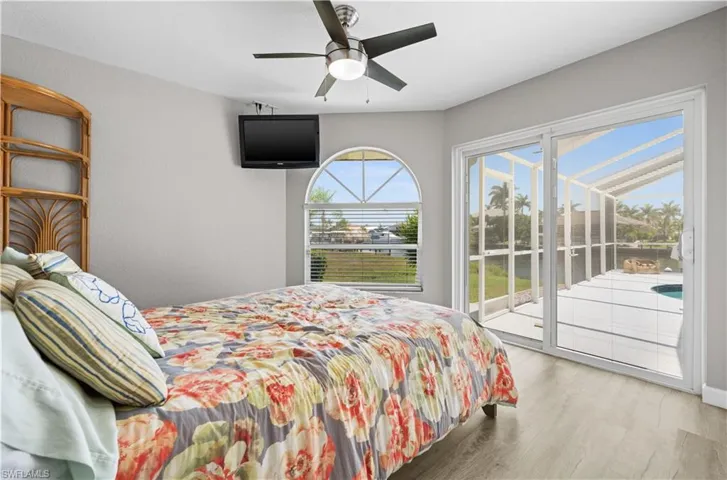 2nd Guest Bedroom with ceiling fan, access to lanai