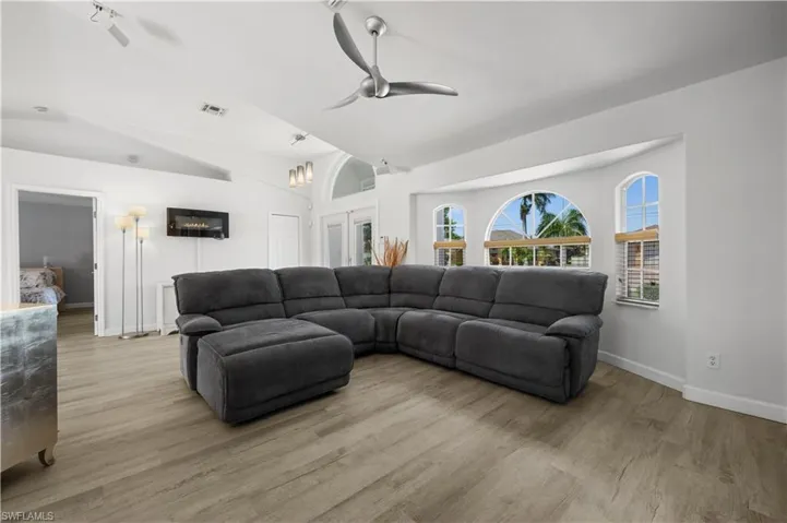 Living room with vaulted ceiling