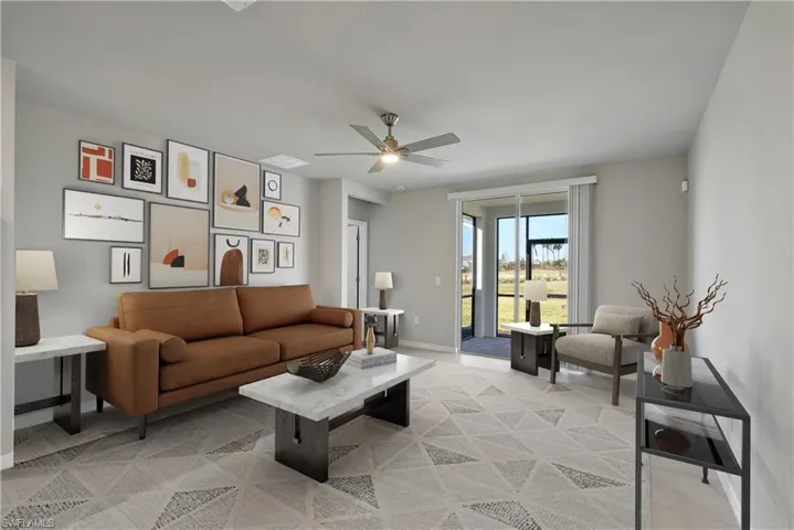 Living room featuring light carpet and ceiling fan