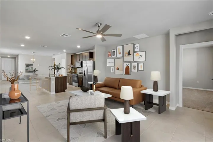 Tiled living room with ceiling fan