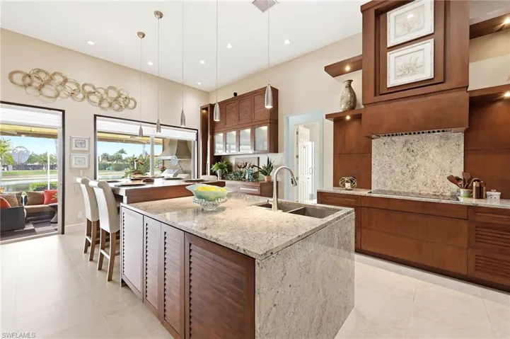 Custom free-standing Kitchen Island with Dual Sink and attached Hightop Dining Table