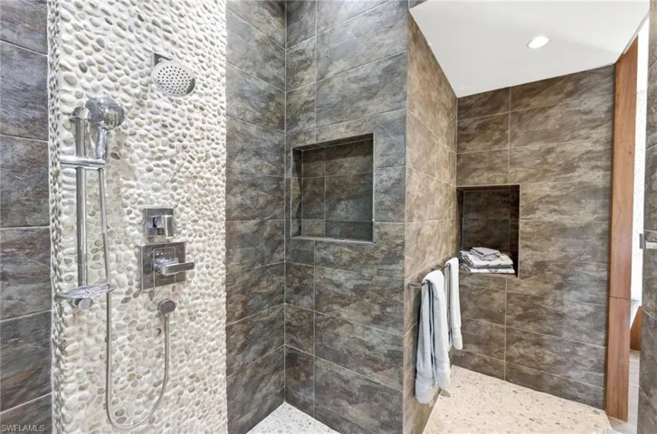 Spa-like walk-in Shower with high-end materials and tiles
