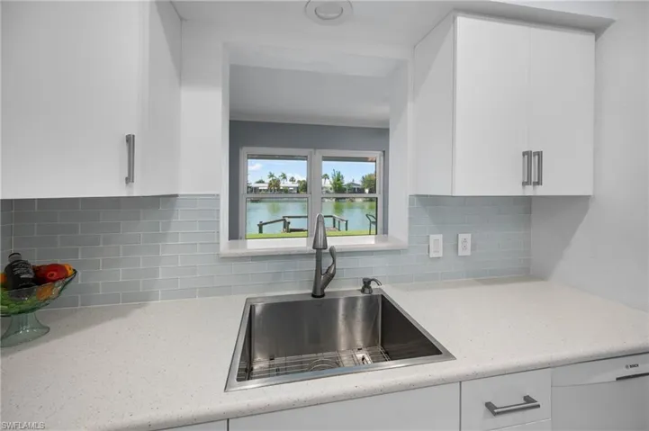 Kitchen pass-through window with water views