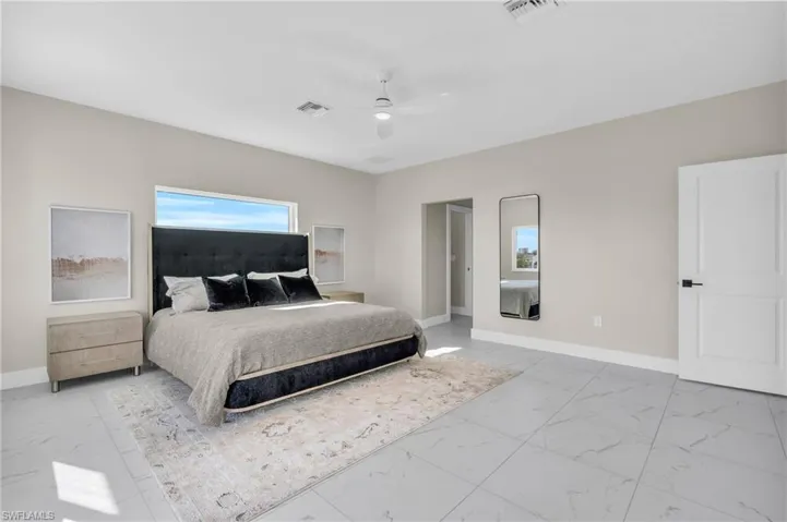 Bedroom with ceiling fan /  virtually enhanced photo