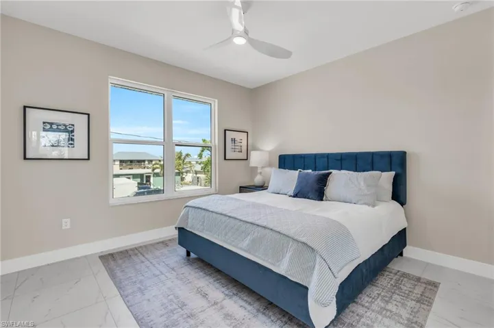 Bedroom with ceiling fan /  virtually enhanced photo