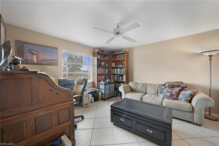 3rd bedroom, used as an office, featuring ceiling fan