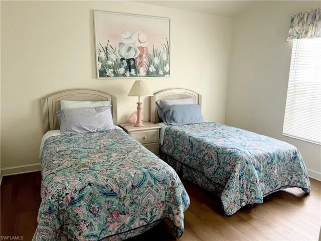 Bedroom featuring dark hardwood / wood-style floors