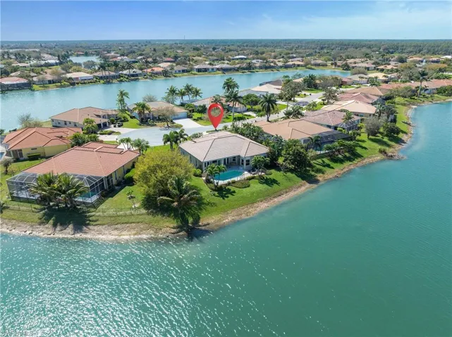 Aerial view with a water view and a residential view