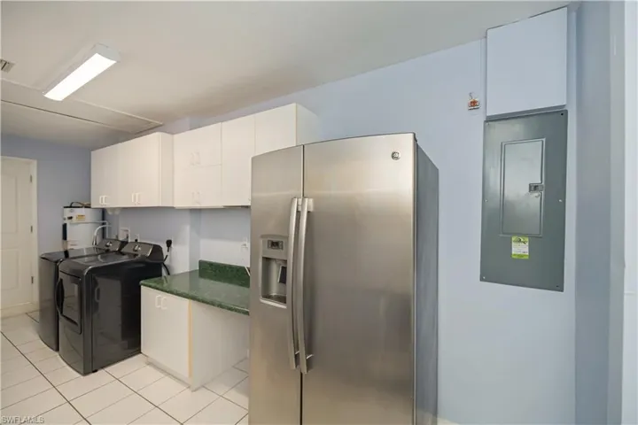 Laundry room with additional Refrigerator