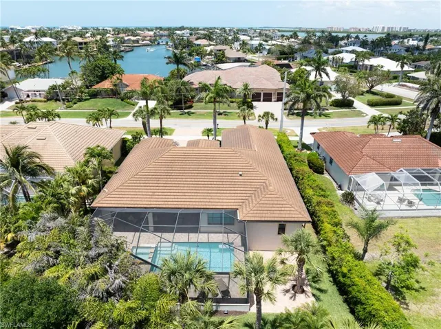 Aerial view with a residential view and a water view