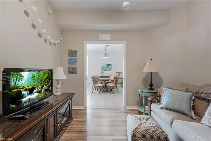 Living area featuring wood finished floors and baseboards