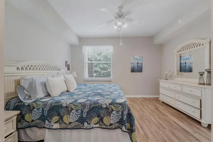 Bedroom featuring light wood-style floors and a ceiling fan