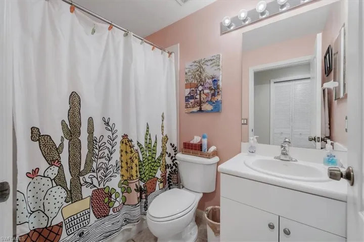 Bathroom featuring vanity and a shower with curtain