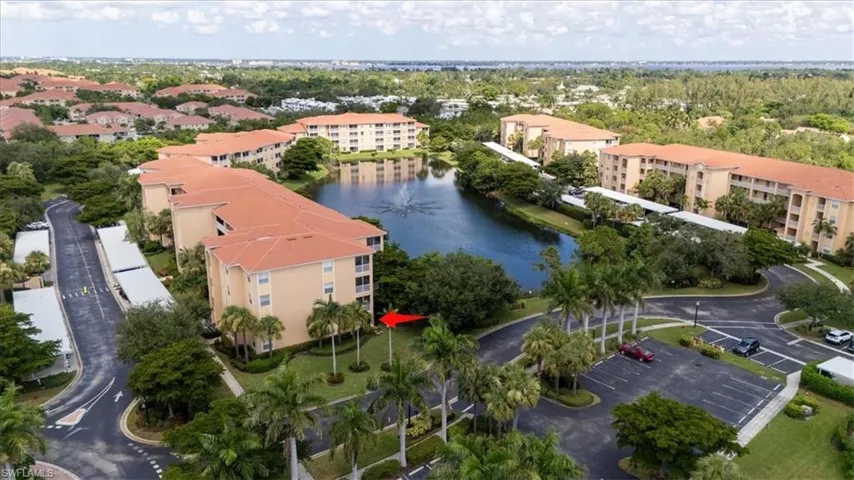 Aerial view of a nearby body of water and apartment complex