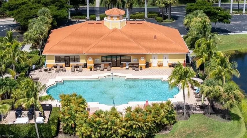 Community pool featuring a patio area