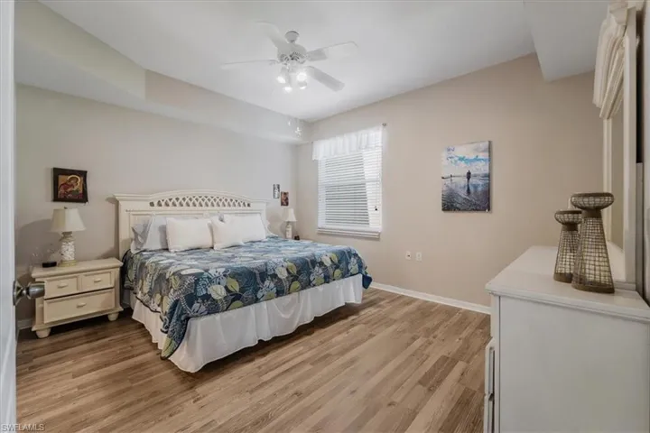 Bedroom featuring light wood-style flooring and ceiling fan