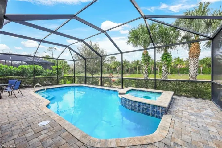 Relaxing Pool / Spa with  Extended Brick Paver Lanai