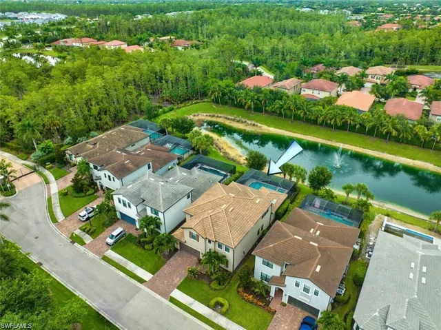 Aerial of Home w/ Lake Views