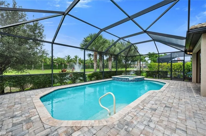 Pool / Hot Tub w/ Extended Lanai, Full Screen Enclosure & Brick Paver Patio
