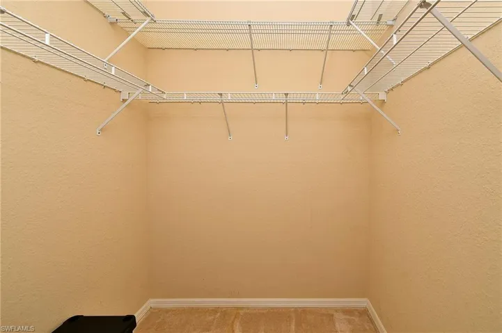 walk in closet for primary bedroom